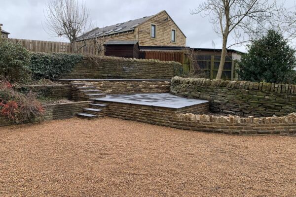 Patio and retaining wall Barkisland