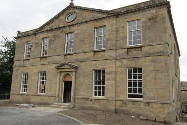 Sliding sash windows installed on grade 1 listed building for Ellisons Construction